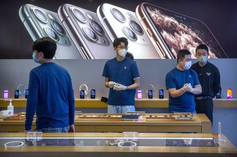 Mitarbeiter im Apple-Store in Peking