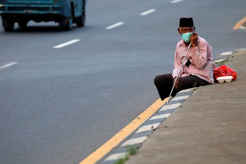 Der Weg aus dem Haus ist in Indonesien nun nur noch mit Schutzmaske erlaubt.