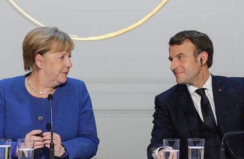 Bundeskanzlerin Merkel und Frankreichs Präsident Macron